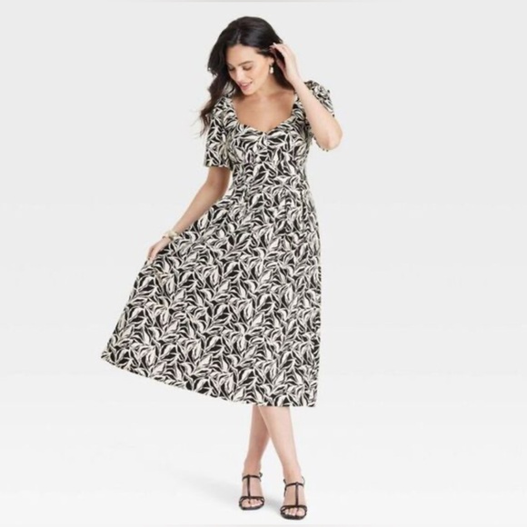 Elegant Black and White Floral Dress - Picture 1 of 13